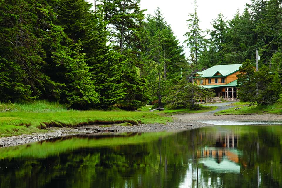 the ancient Haida village of K’uuna Llnagaay (Skedans)—the third largest in an archipelago of 150 islands known as Haida Gwaii, off British Columbia’s west coast.