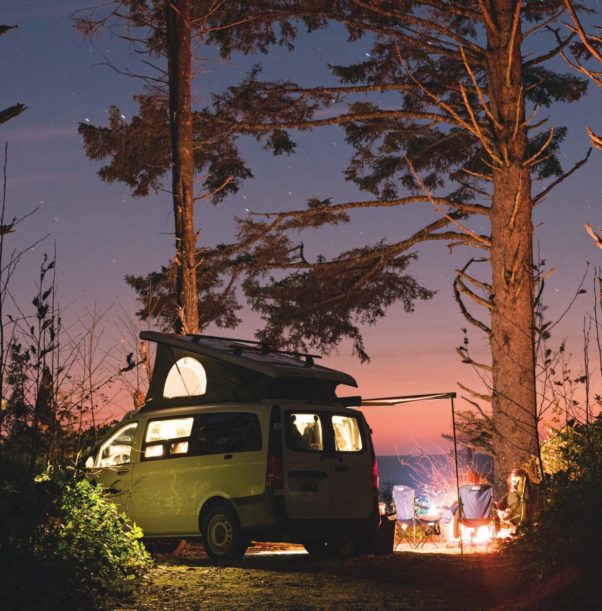 Staying snuggly in the autumn forest gets an assist from a GoCamp van and amenities for roving.