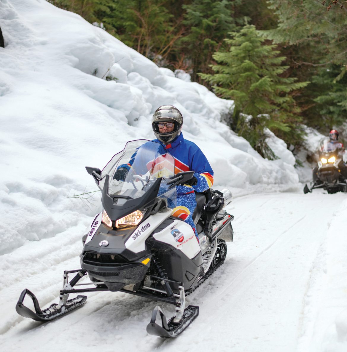 Exploring by snowmobile near Leavenworth rewards with dramatic scenery.