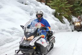 Exploring by snowmobile near Leavenworth rewards with dramatic scenery.