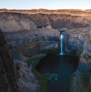 The state’s waterfall, Palouse Falls, is a light show for artists.