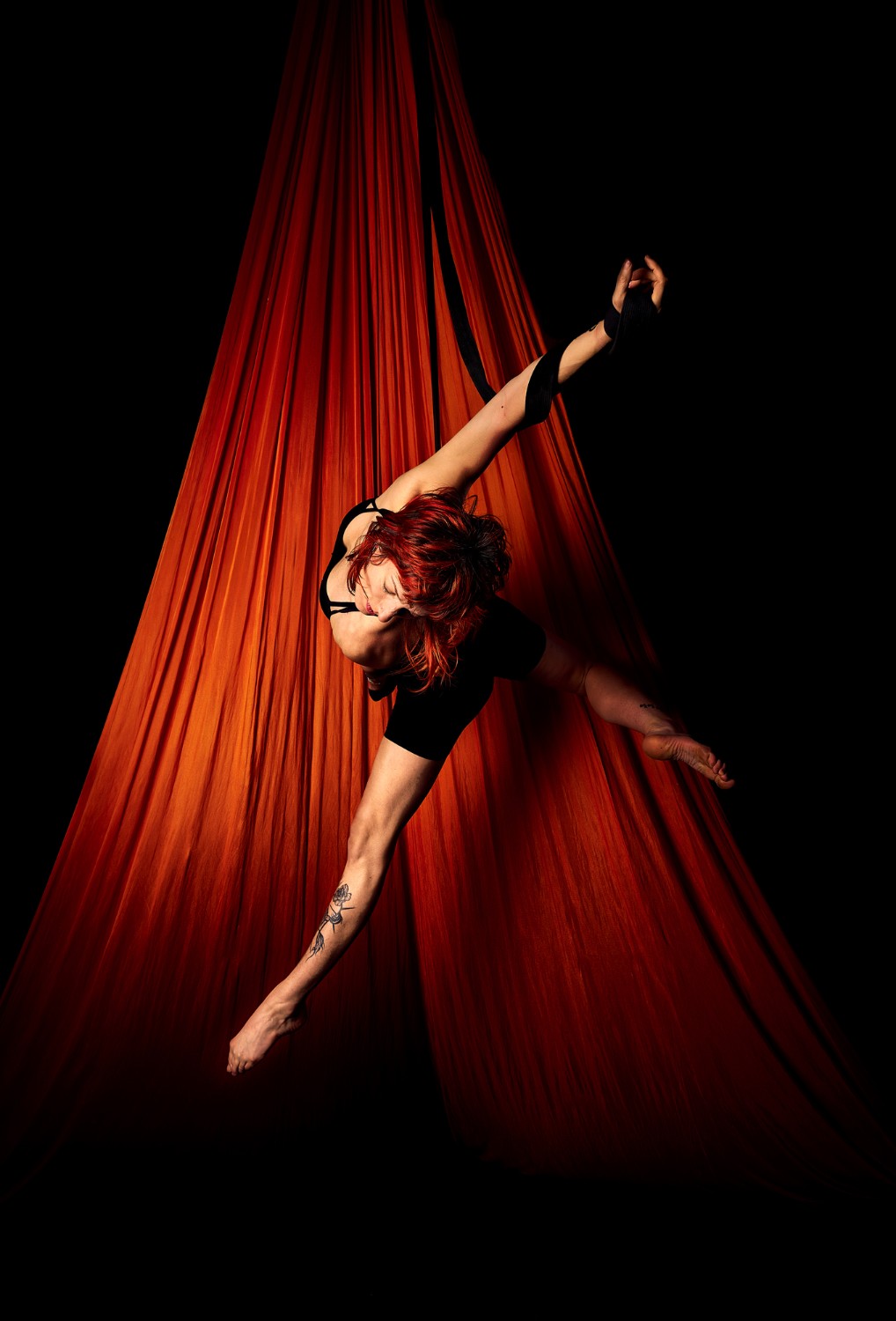 Olympia aerial artist Giselle performs in her home studio.