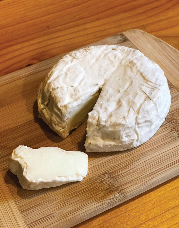 Glendale Shepherd's White Cap cheese is a soft-ripened, bloomy rind cheese.