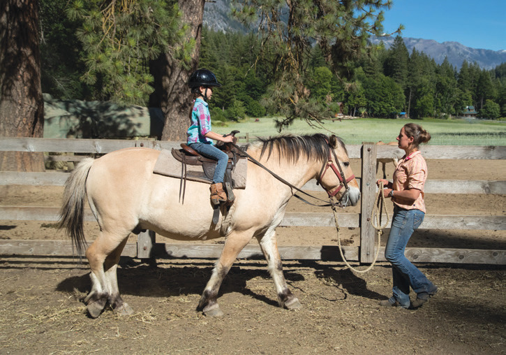 Stehekin Valley Ranch offers trail rides and lessons for guests.